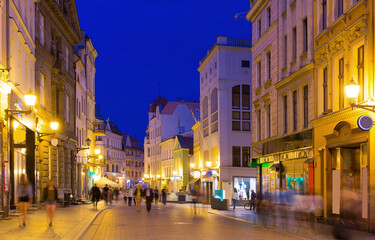 Fototapeta na wymiar Cityscape of Torun with vibrant streets at spring twilight, Poland