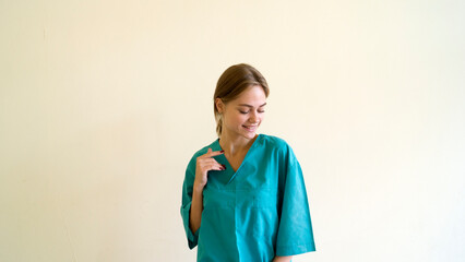 Portrait of a friendly female doctor. isolated