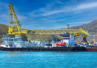 vessel with a crane at the port