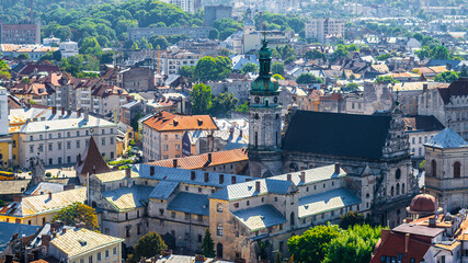 Fototapeta na wymiar LVIV, UKRAINE - JULY 10, 2019: Roofs and domes of ancient city Lviv.