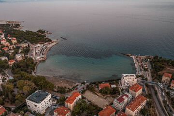 Aerial drone shot of Bacvice city beach near Split old town after sunset in Croatia