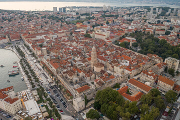 Fototapeta na wymiar Aerial drone shot of Diocletian Palace by port riva in Split old town in Croatia in sunset