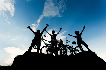 Fototapeta na wymiar Bike family having active time together