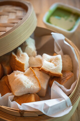 Slice steamed bread and pandan custard, Thai dessert.