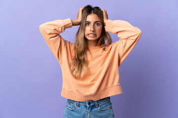 Young hispanic woman over isolated purple background doing nervous gesture