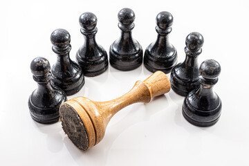 queen and pawn. falling old dictator surrounded by young generation - youth bulge above old formations - regime change chess metaphor