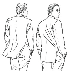 A young man in a classic suit stands with his back turned.