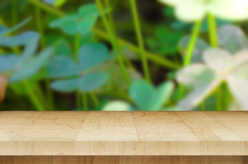 green leaves with nice table wooden table