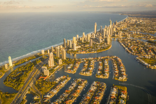 Aerial view of Macintosh island residential building along Nerang river in Surfers Paradise, Gold Coast, Queensland, Australia.