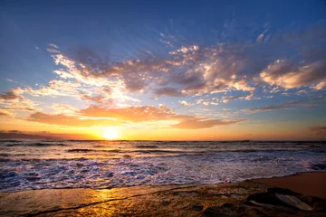 Foto op Canvas Zonsondergang Strand waves breaking on rocks close to Sunset beach, Oahu, Hawaii  © Nataliya Hora