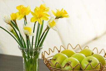 .Bouquet of spring flowers daffodils in the interior. March 8