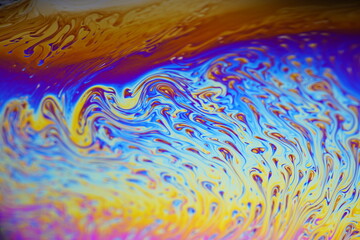 Colorful soap bubbles, iridescent liquid