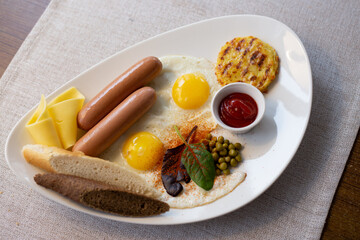 Scrambled eggs with sausages