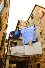 Obraz na płótnie Canvas Linen is hanged to dry. Everyday life in Venice, Italy. 