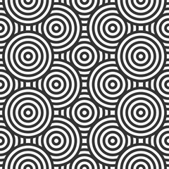 Abstract seamless pattern. Concentric circles. Intersecting repeating circles background. Overlaping circles. Stylish texture. Repeating geometric tiles. Flat design. Vector monochrome background.