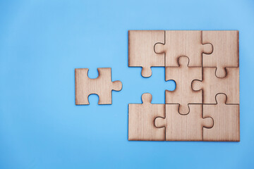  jigsaw puzzle pieces on blue background,  Business solutions, success and strategy, Business partnership concept. Copy space.