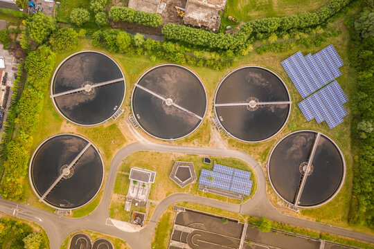 Aerial view of circular water tanks of a factory in Harelbeke, West Flanders, Belgium.