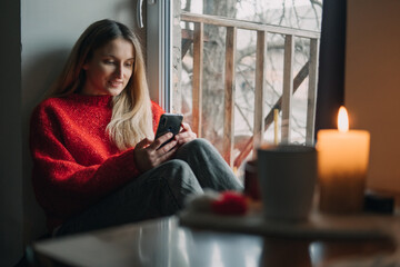 Woman using online dating app on laptop. Valentines Day, dating, meeting During The Coronavirus Outbreak. Love at distance in the time of coronavirus.