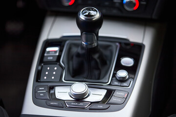 Modern luxury interior shift gear of manual gearbox and Multi Media Interface controls for...