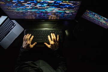 hacker coding at night cybersecurity concept