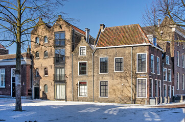 Schiedam, The Nethelrands, February 11, 2021: historic houses on Vismarkt (Fish Market) square on a cold but sunny day in winter