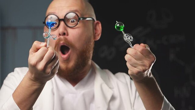 Unusual show-entertainment of a crazy chemist. An amazing chemist shows experiments. Slow motion.