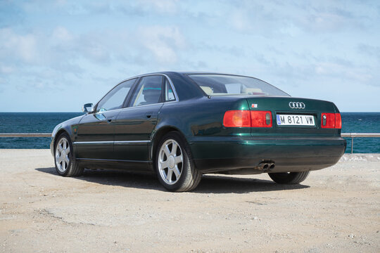 BARCELONA, SPAIN-FEBRUARY 2, 2021: Audi S8 (First generation, D2, 1996 - 2003) parking next to sea (rear view)