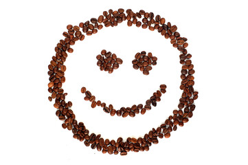 Isolated coffee grains lined up in the shape of a face or emoticon