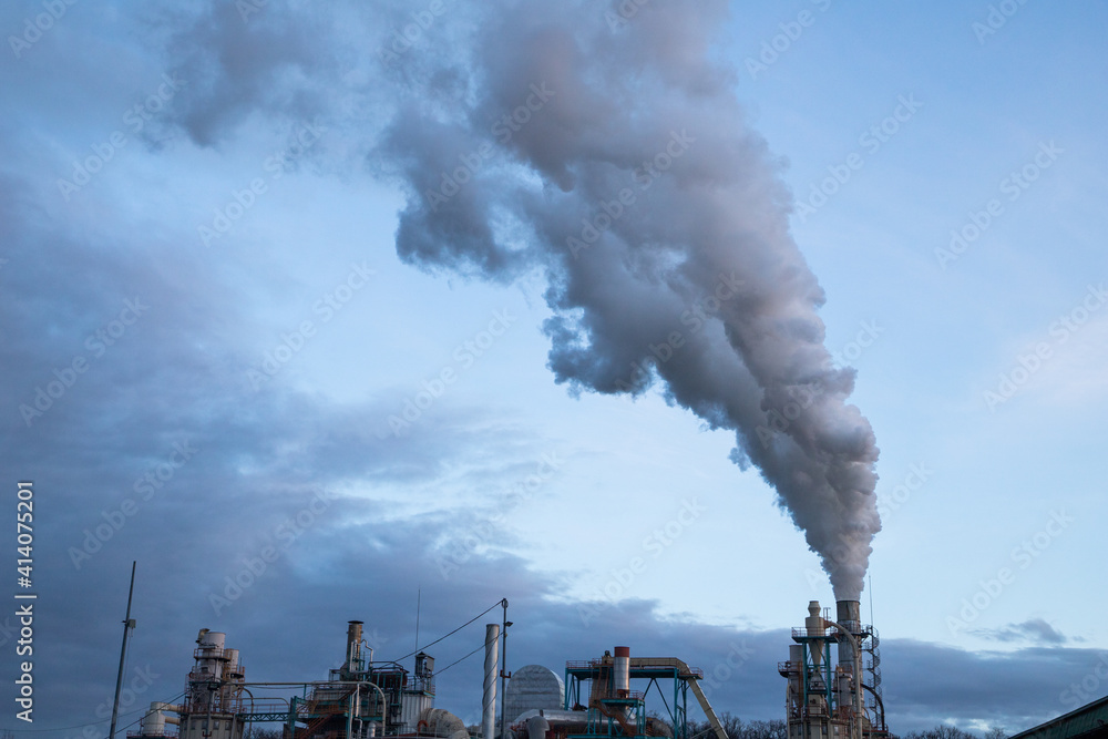 Wall mural smoke coming out of factory chimney industry and global warming