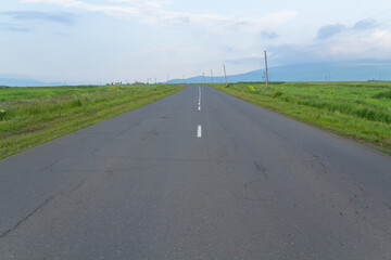 asphalt road with landscape