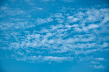 Beautiful cirrus cloudy bright blue sky background textures, wallpaper, replacement, light