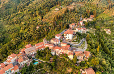 Aerial view of the Tuscan village Mommio Castello, at the top of the hill of Versilia, province of...