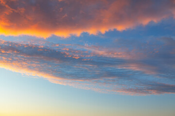 Pastel colored clouds on the morning sky 