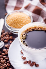 cup of fragrant fresh coffee on a dark stone background