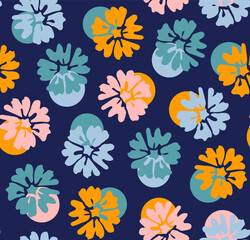 Fototapeta na wymiar Multicolored mix of vector flowers and dots as cropped seamless pattern with blue background.