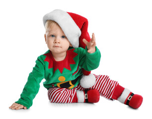 Cute baby in Santa's elf clothes sitting on white background. Christmas suit