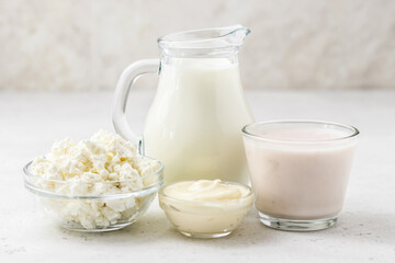 Milk in a jar and various dairy products. Copy space.