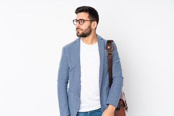 Fototapeta premium Caucasian business man isolated on white background looking side