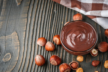 toasts with chocolate butter on a dark wooden rustic background