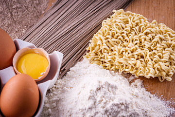 instant egg noodles on a wooden rustic background