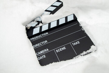 Clapper board in the snow