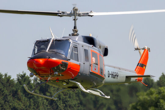 Bell 212 helicopter landing at Ahlen-Nord heliport. JUN 5, 2016