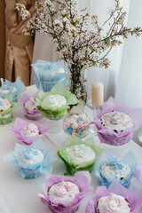 Beautiful Easter cakes on a decorated light table. A light holiday of Easter.