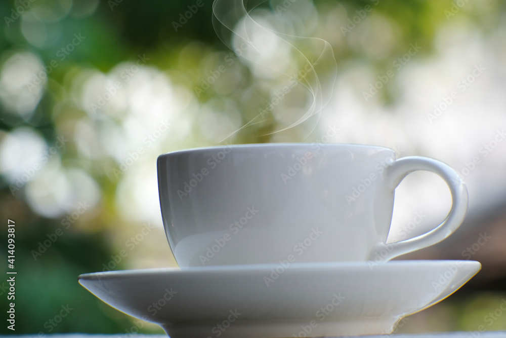 Wall mural cup of coffee on the table