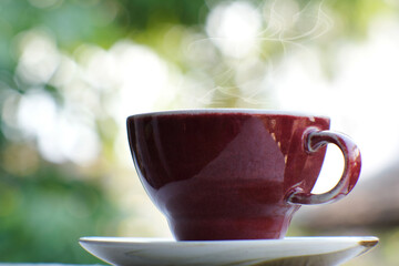 Coffee cup on table background and coffee in the morning
