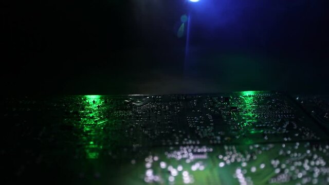 Burning microcircuit of complex electronic equipment. Factory breakdown concept. Breakdown of a new microcircuit. Selective focus