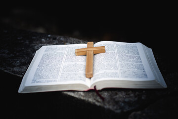 The cross is placed in the center of the scriptures. Natural background It is a request for...