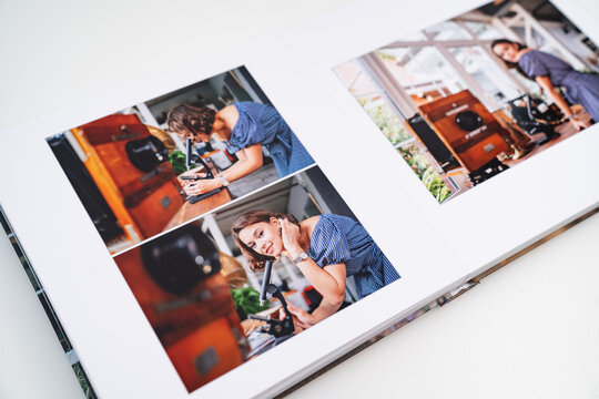 pages of photobook from photo shoots of woman with a microscope in retro house.