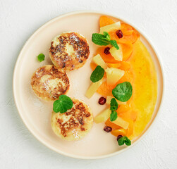 cheese pancake with fruit and sweet sauce