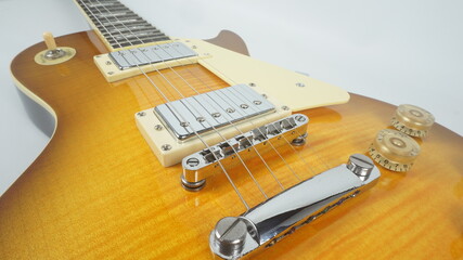 Electric guitar body detail, close-up view.